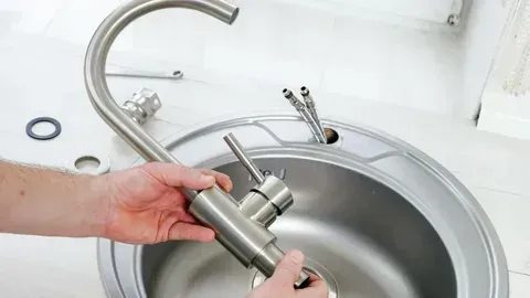 kitchen sink repair in Burlington with updated plumbing fixtures and neat finish